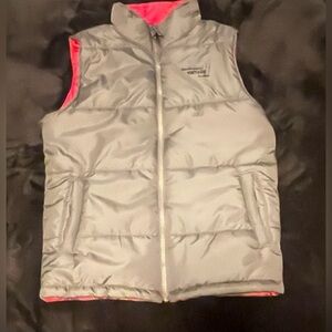 Weatherproof vintage brand gray zip up vest.  Charcoal gray with maroon color